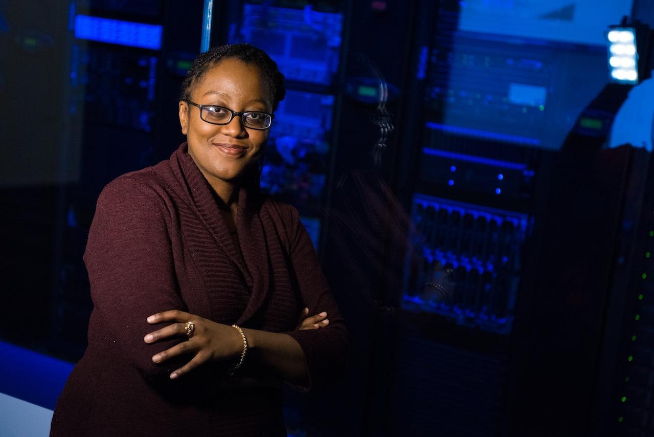 Woman in front of a data center